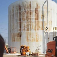 Efficient Completion of a U.S. Military Oil Storage Tank Blasting Project